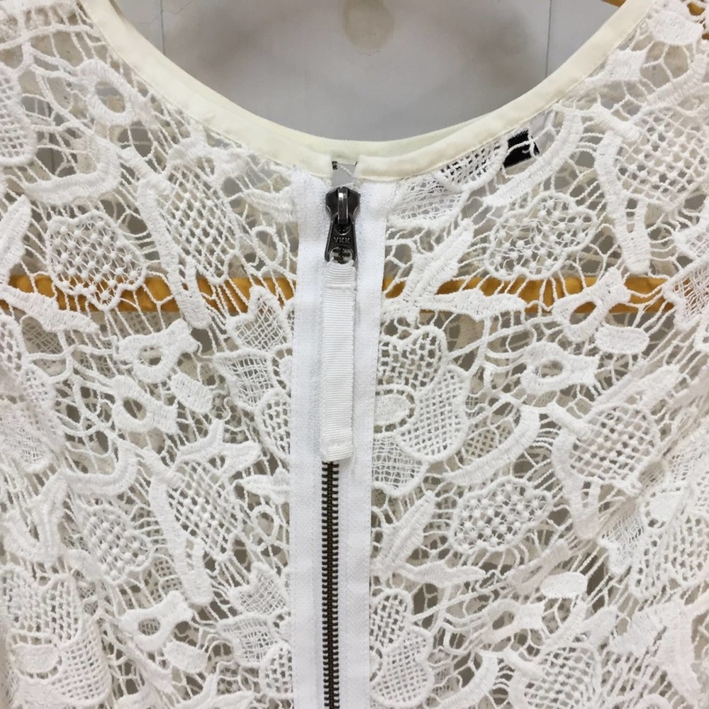 CAbi White Crocheted Lace Sheer Peplum Top - Picture 15 of 16